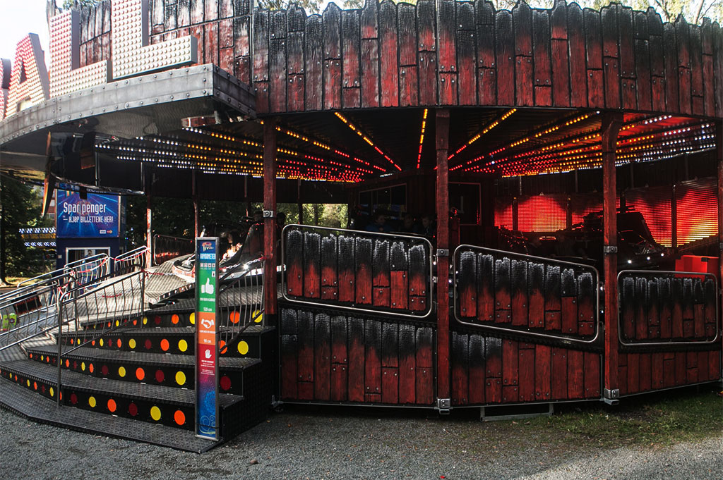 fiber optic lighting illuminates the carriages of this exciting ride